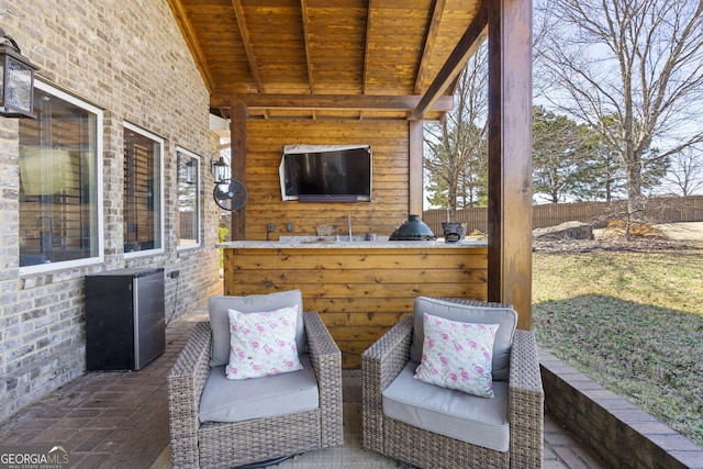 view of patio with fence