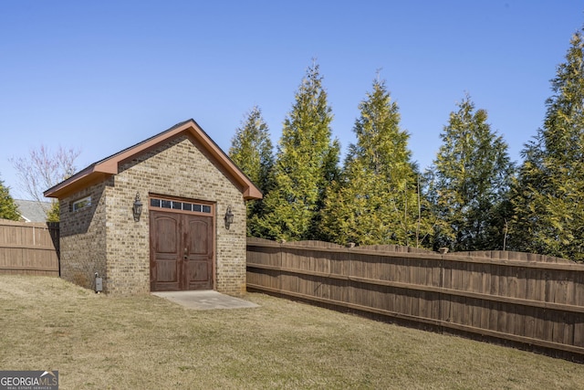 view of outbuilding with an outdoor structure and fence