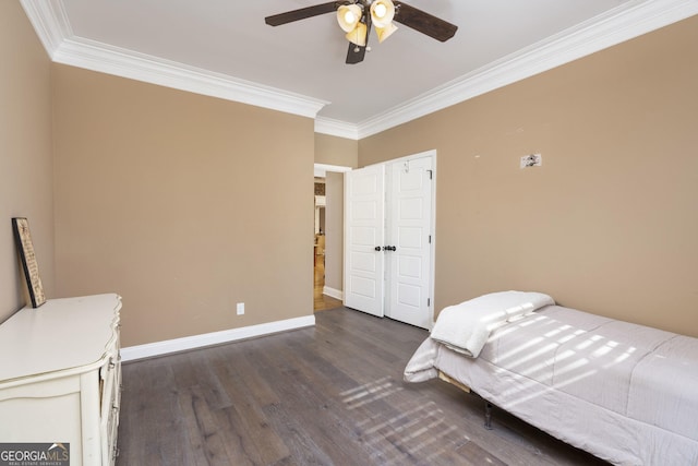 bedroom with ceiling fan, ornamental molding, wood finished floors, and baseboards