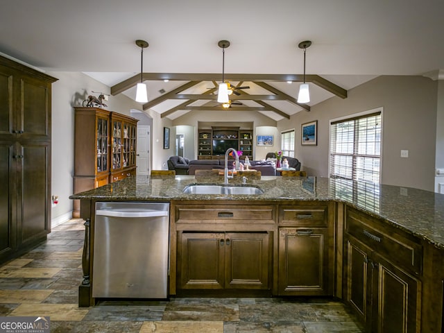 kitchen featuring lofted ceiling with beams, a sink, open floor plan, hanging light fixtures, and stainless steel dishwasher