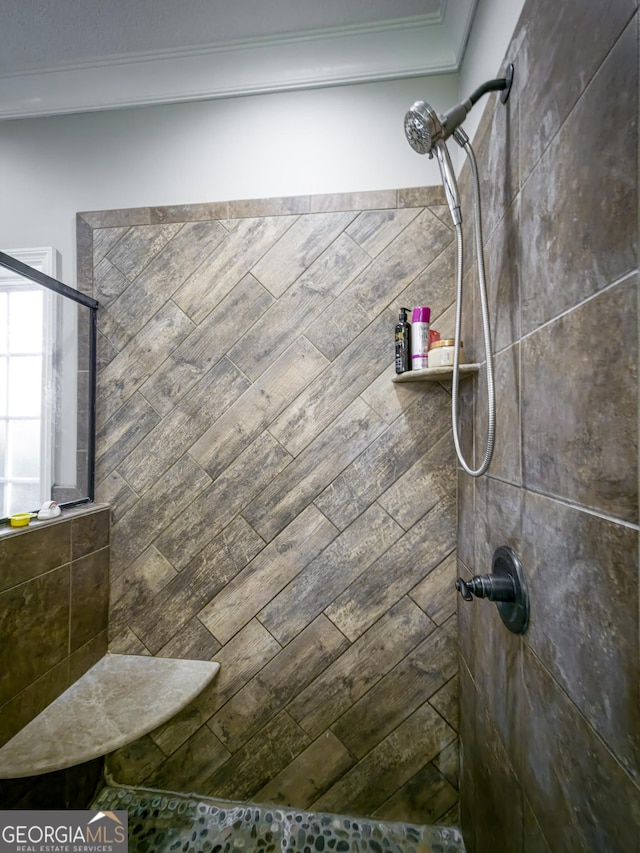 bathroom featuring tiled shower