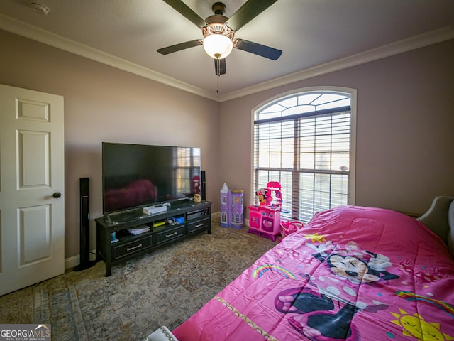 bedroom featuring carpet, baseboards, ceiling fan, and crown molding