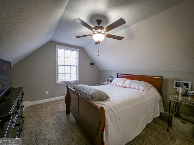 carpeted bedroom with a textured ceiling, ceiling fan, lofted ceiling, visible vents, and baseboards