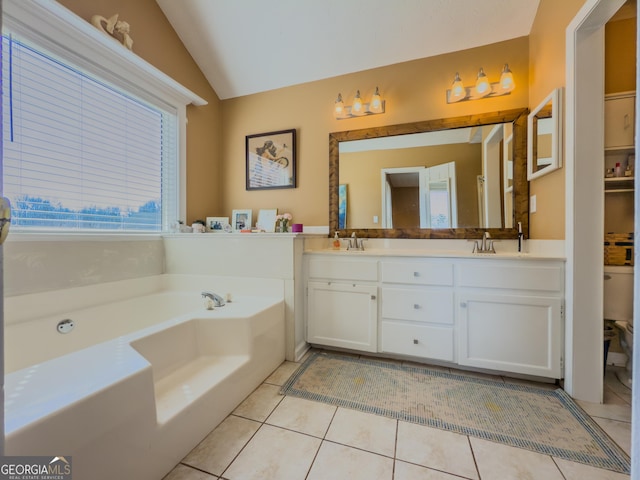 full bathroom with a garden tub, double vanity, lofted ceiling, a sink, and tile patterned flooring