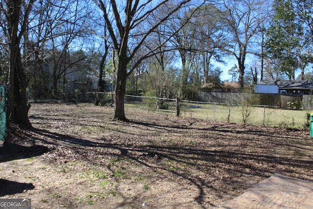 view of yard with fence