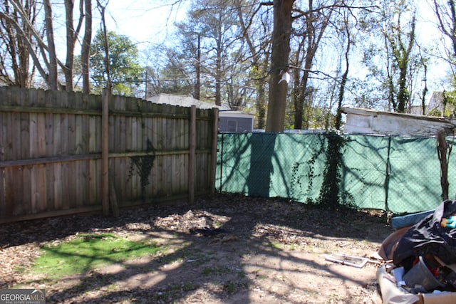 view of yard with fence