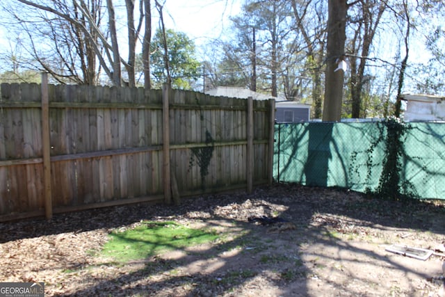 view of yard featuring fence