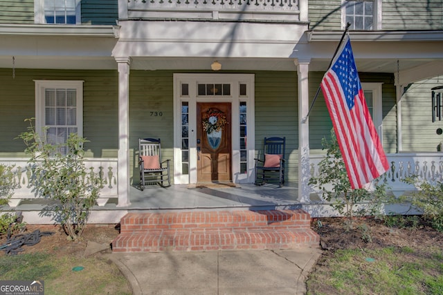 entrance to property with a porch