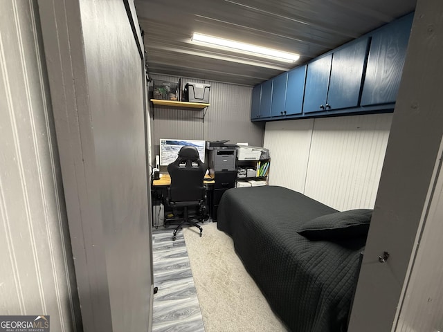 bedroom with light wood finished floors