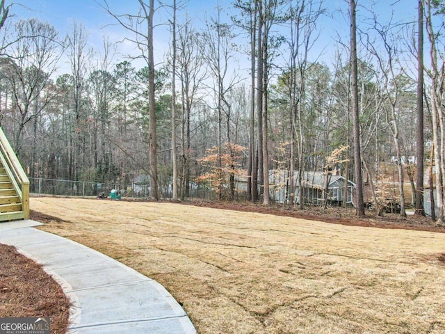 view of yard with fence