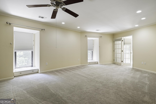 25309 Plantation Dr NE Unit 309, Atlanta, GA 30324 - unfurnished room with ornamental molding, recessed lighting, a ceiling fan, healthy amount of natural light, and light carpet