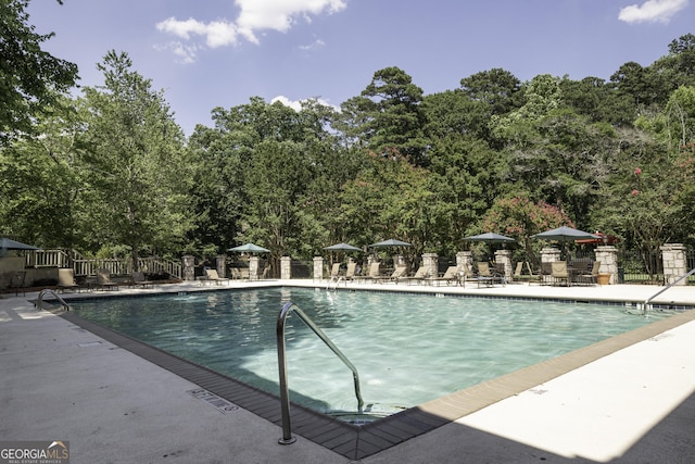 25309 Plantation Dr NE Unit 309, Atlanta, GA 30324 - community pool with a patio