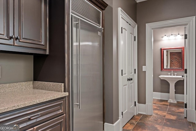 bathroom featuring baseboards