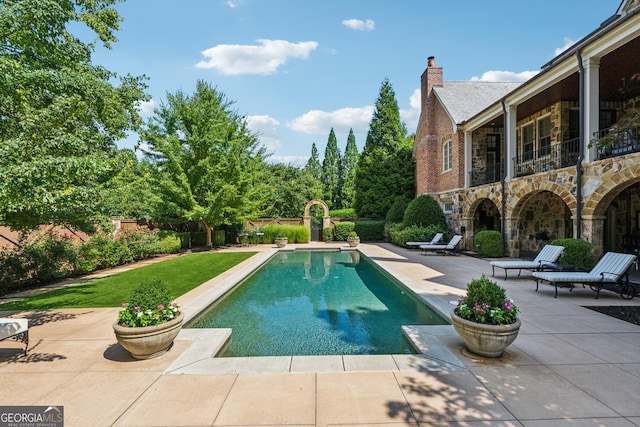 13940 Haystack Ln, Milton, GA 30004 - outdoor pool featuring a patio area