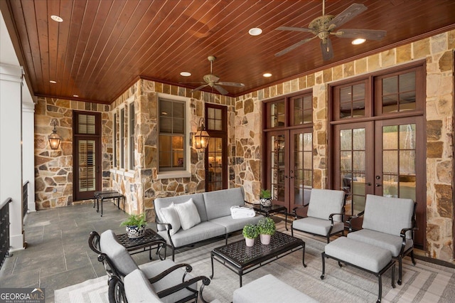 view of patio with an outdoor hangout area, french doors, and a ceiling fan