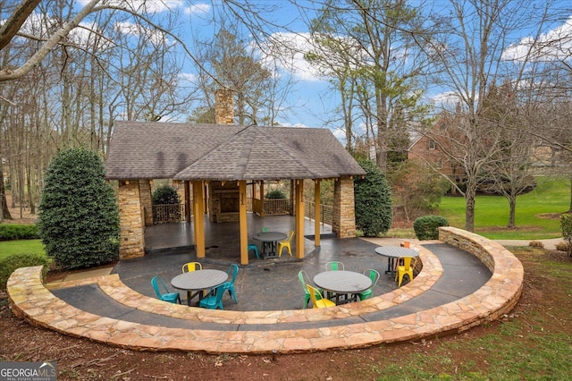 surrounding community featuring a gazebo, a yard, and a patio