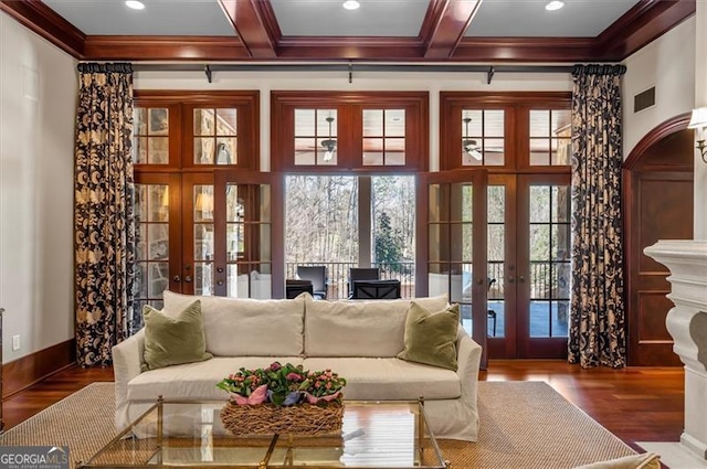 living room with french doors, wood finished floors, crown molding, beamed ceiling, and recessed lighting