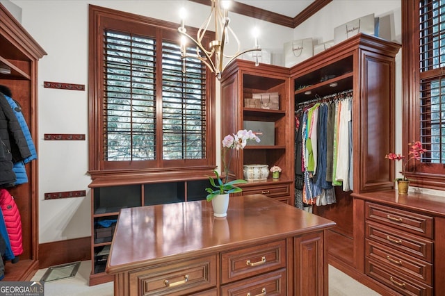 spacious closet with a chandelier