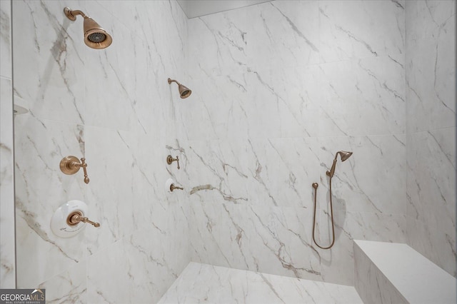 room details with a marble finish shower