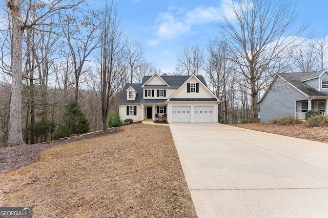 view of front facade featuring a garage and driveway