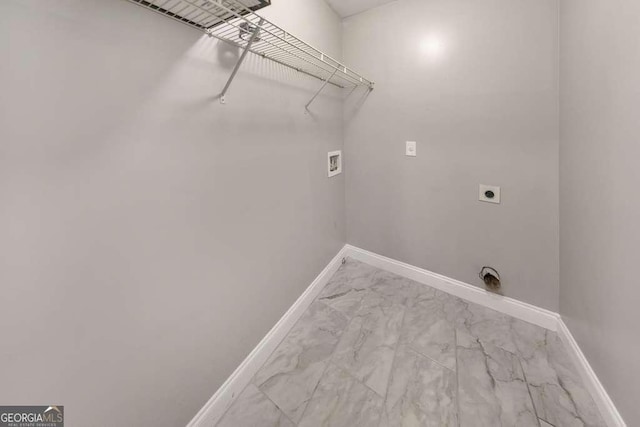 washroom featuring laundry area, baseboards, marble finish floor, washer hookup, and electric dryer hookup