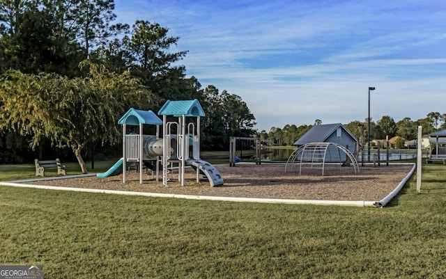 community play area with a lawn