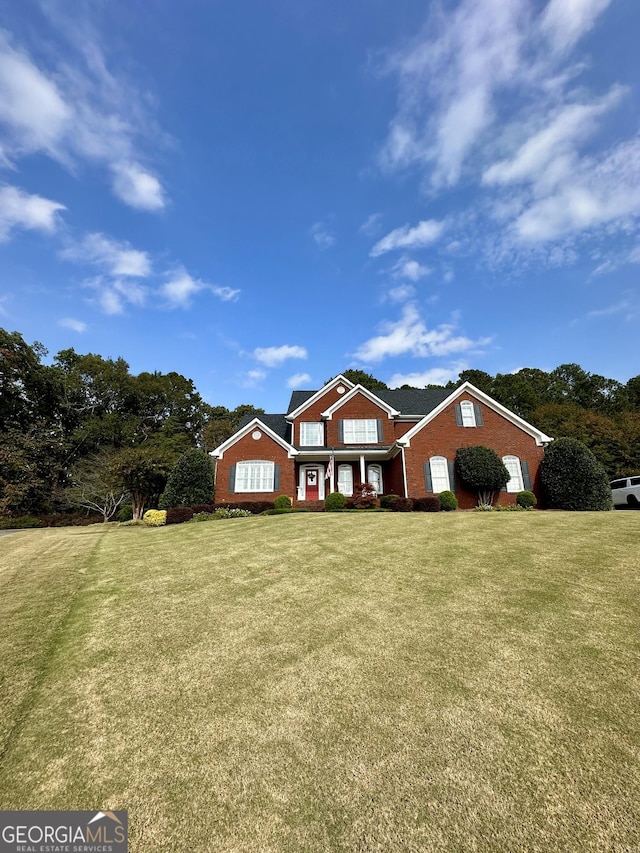 3585 Shepherds Ln, Loganville, GA 30052 - view of front of home featuring a front lawn and brick siding