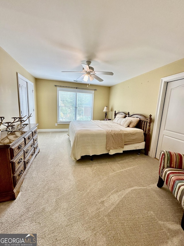 3585 Shepherds Ln, Loganville, GA 30052 - carpeted bedroom featuring ceiling fan and baseboards