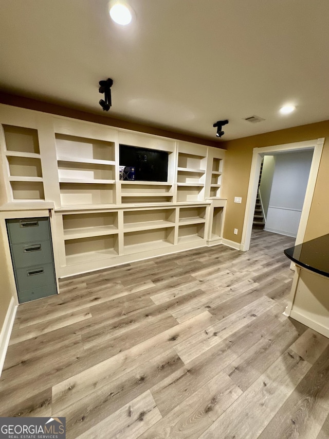 3585 Shepherds Ln, Loganville, GA 30052 - unfurnished living room with recessed lighting, wood finished floors, visible vents, baseboards, and stairs