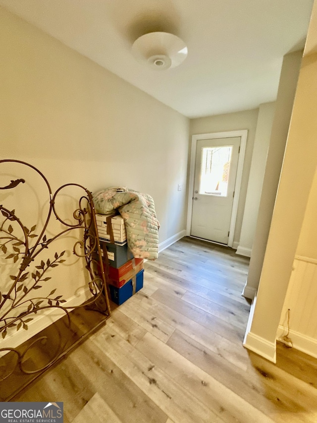 3585 Shepherds Ln, Loganville, GA 30052 - doorway to outside with baseboards and wood finished floors
