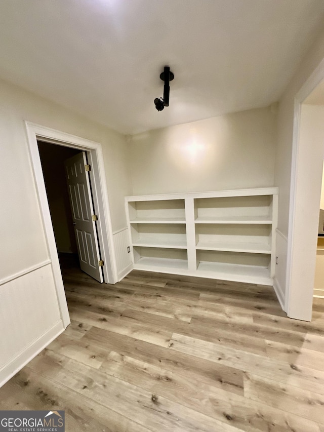 3585 Shepherds Ln, Loganville, GA 30052 - interior space with a wainscoted wall and wood finished floors