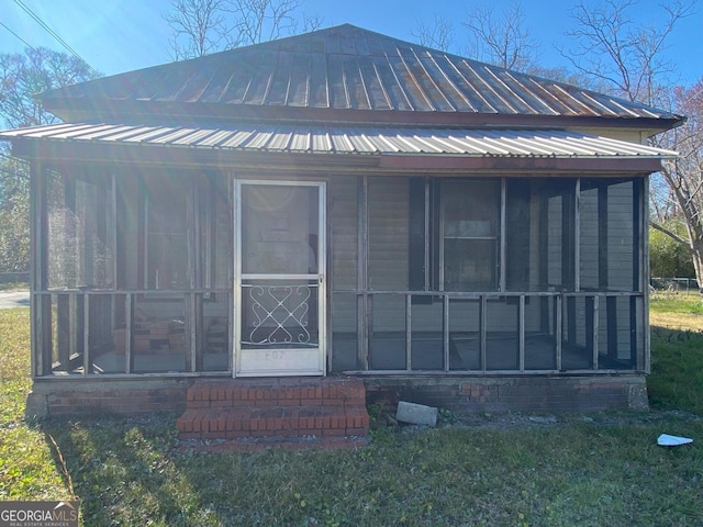 exterior space with a sunroom