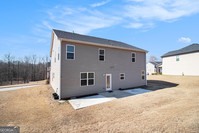 back of property with a patio area