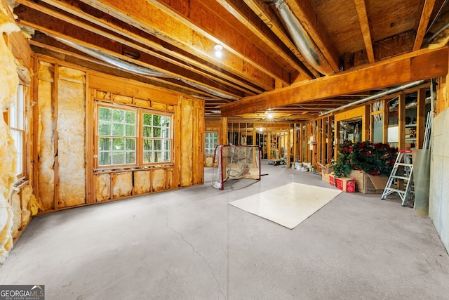 miscellaneous room with concrete flooring