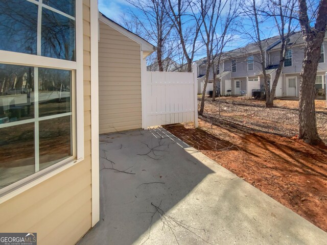 11403 S Grove Dr, Hampton, GA 30228 - view of patio / terrace featuring a residential view
