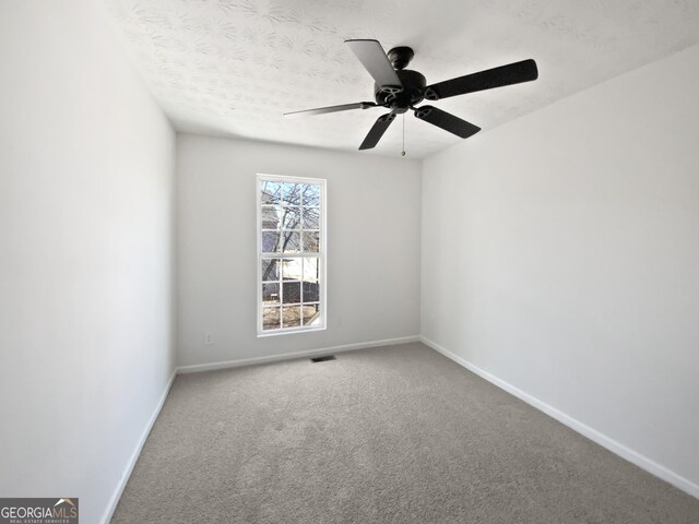 11403 S Grove Dr, Hampton, GA 30228 - carpeted empty room featuring ceiling fan and baseboards