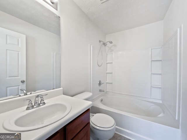 11403 S Grove Dr, Hampton, GA 30228 - bathroom with vanity, shower / bath combination, and a textured ceiling