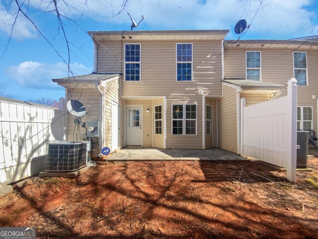 11403 S Grove Dr, Hampton, GA 30228 - back of property featuring a patio
