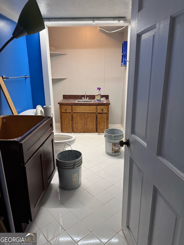 bathroom featuring vanity and tile patterned floors