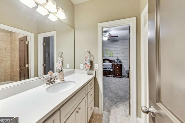 full bathroom featuring vanity and tile patterned floors