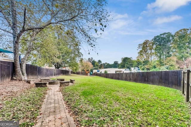 view of yard featuring a fenced backyard