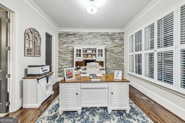 office space featuring dark wood-style floors, crown molding, and baseboards