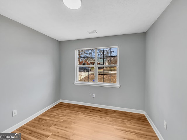 1681 Graystone Dr, Hampton, GA 30228 - spare room with wood finished floors