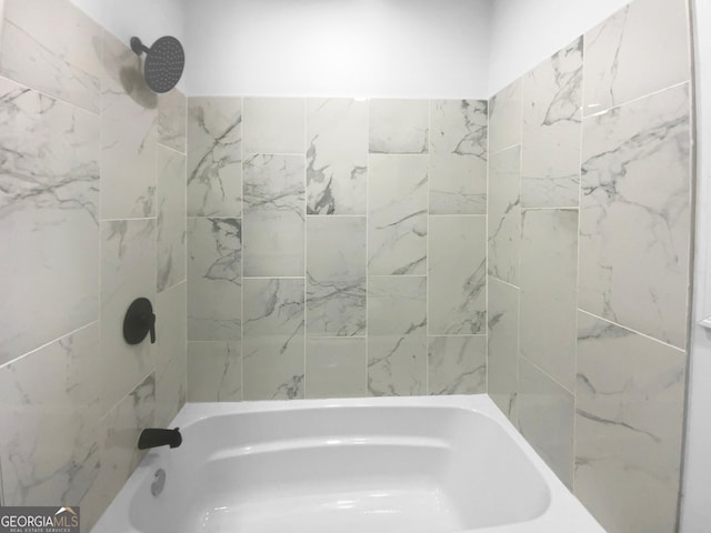 bathroom with shower / bathtub combination