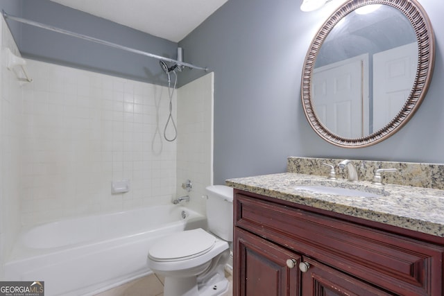 bathroom with vanity, bathing tub / shower combination, and toilet