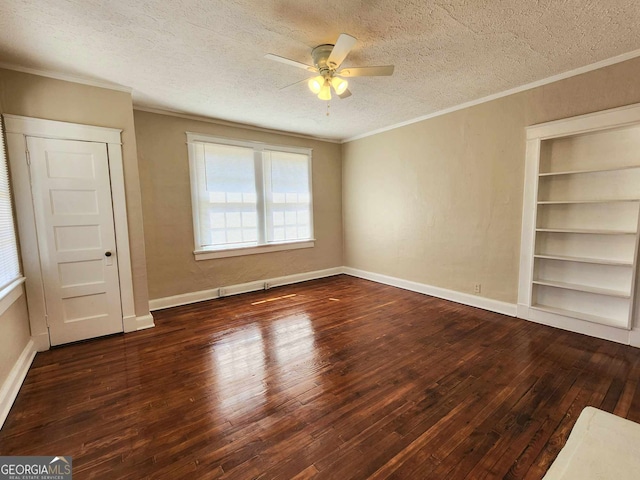 unfurnished bedroom featuring wood-type flooring, crown molding, a textured ceiling, and baseboards