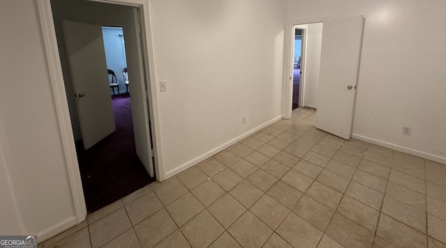 5546 Wellborn Creek Dr, Lithonia, GA 30058 - empty room with light tile patterned floors and baseboards
