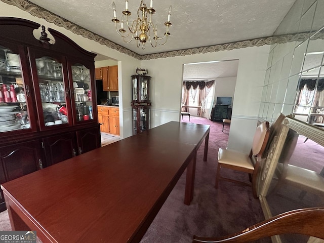5546 Wellborn Creek Dr, Lithonia, GA 30058 - dining area with a chandelier, light colored carpet, and a textured ceiling
