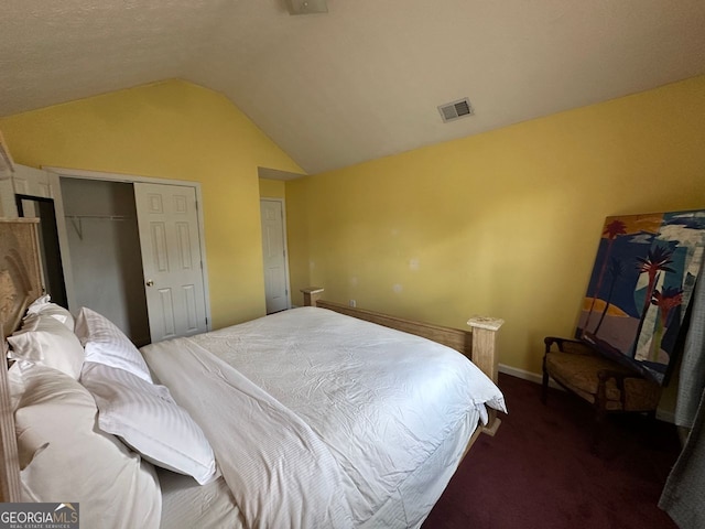 5546 Wellborn Creek Dr, Lithonia, GA 30058 - carpeted bedroom featuring lofted ceiling, a closet, and baseboards