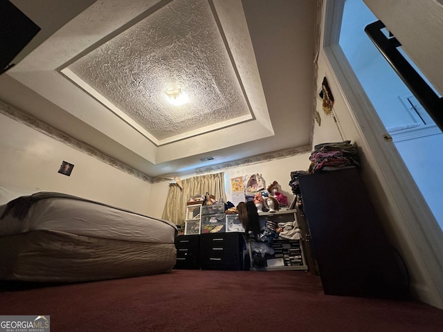 5546 Wellborn Creek Dr, Lithonia, GA 30058 - carpeted bedroom with a tray ceiling